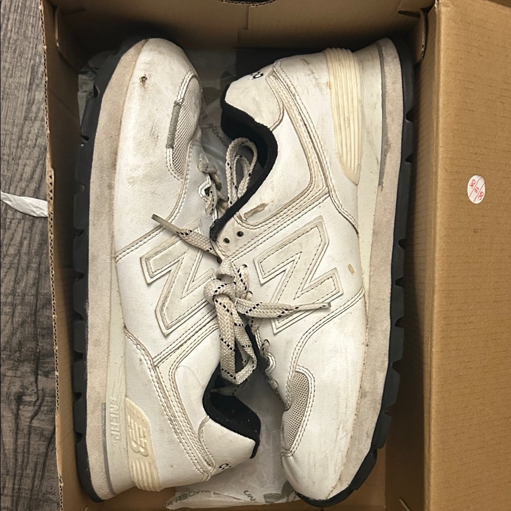 New Balance Cream and Black Sneakers